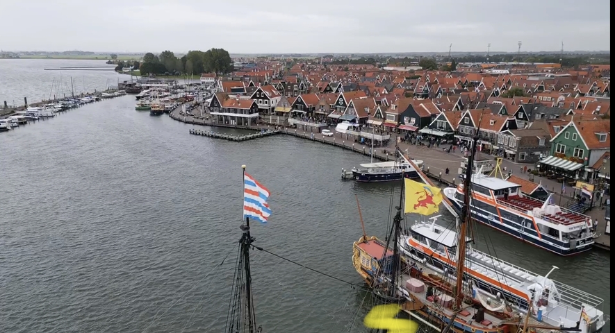       Scenic view of a harbor in Volendam with boats.
  