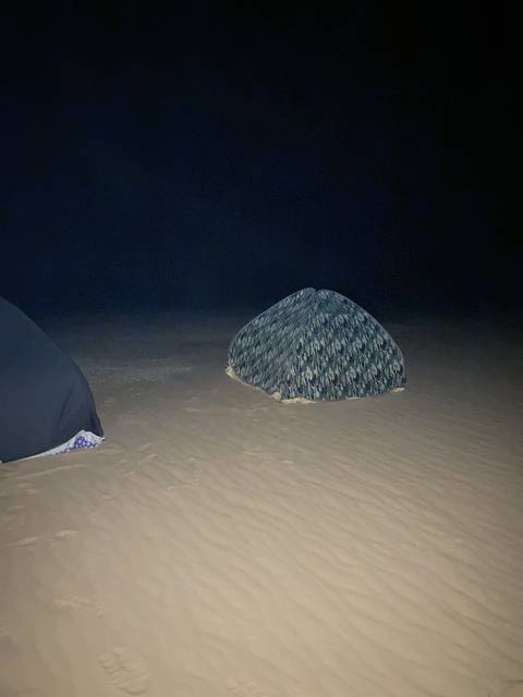 Desert landscape with patterned sand.