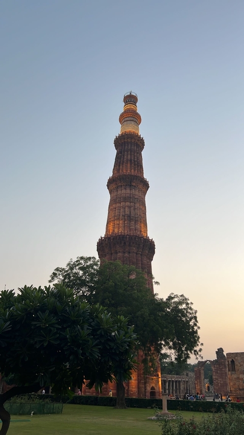 Historic tower with beautiful architecture in fading light.