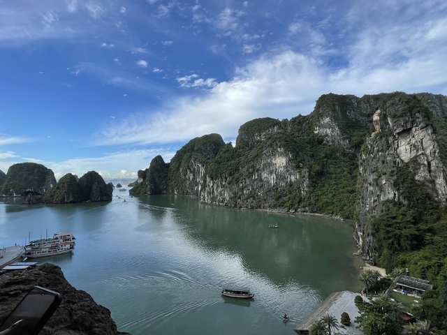 Scenic view of a bay with limestone karsts and boats