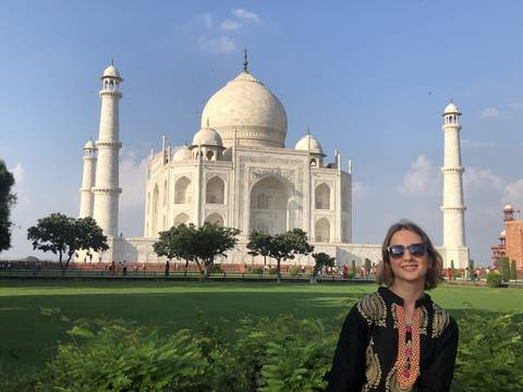       Visitor in front of the iconic Taj Mahal.
  