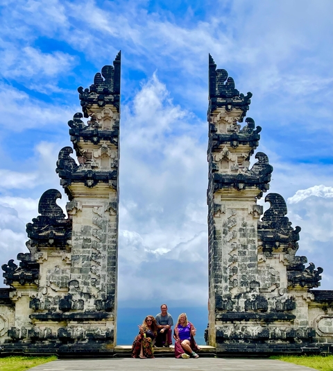 Traditional Balinese gate structure with sky in the background.