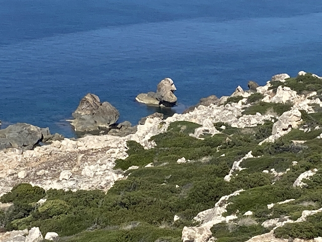 Rocky coastline with blue sea.