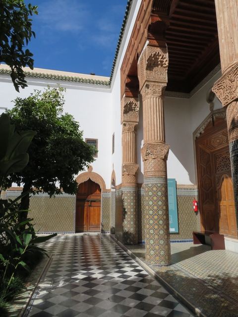 Intricate tilework and architecture in a Moroccan building.