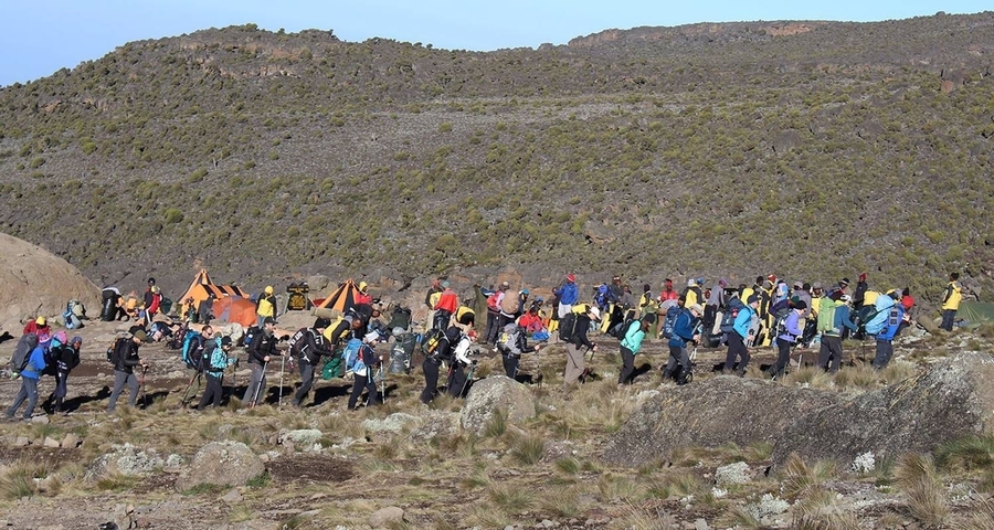 Group of hikers preparing for a trek on Kilimanjaro.