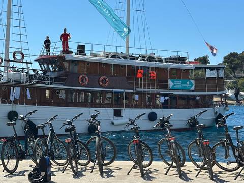 Upside-down image of a boat with bikes.