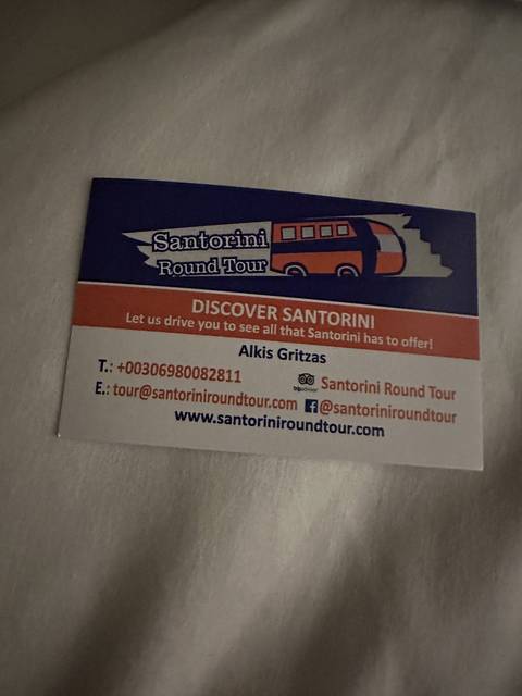       Business card for Santorini tours.
  