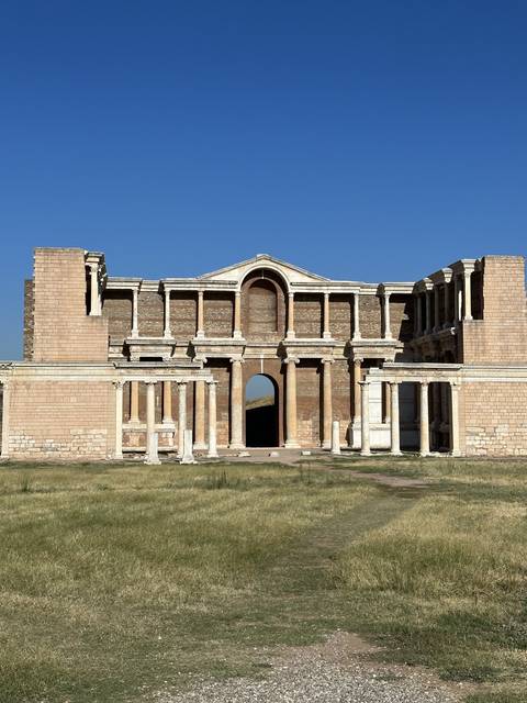       Ancient ruins with a clear sky.
  