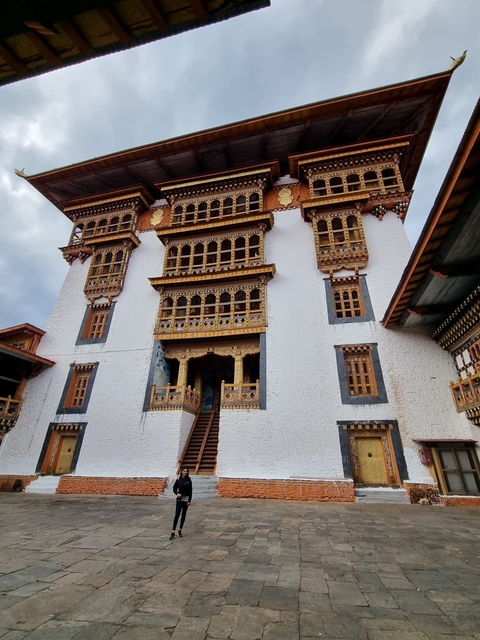       Facade of a traditional Bhutanese monastery.
  