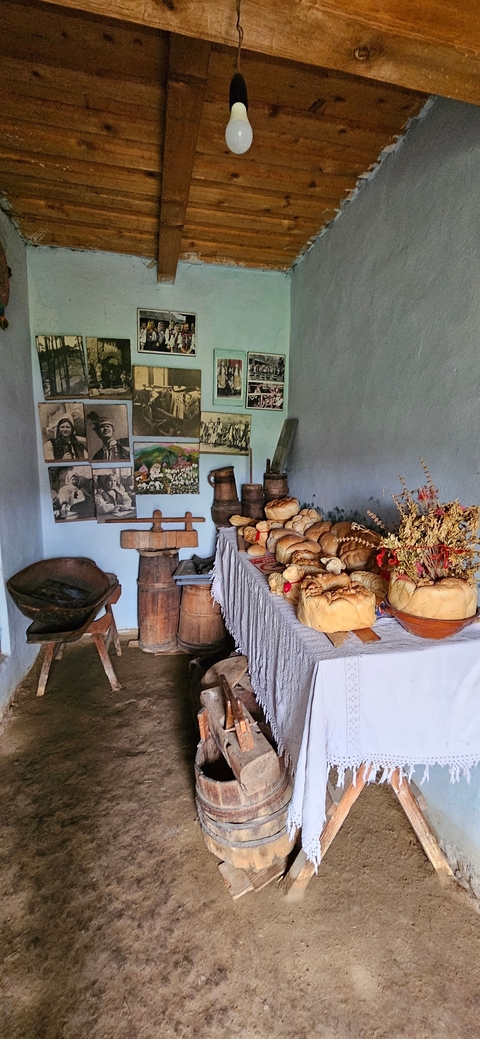       Display of traditional breads and artifacts.
  