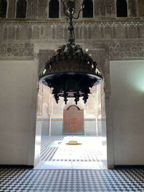       Intricate fountain with decorative tiles.
  