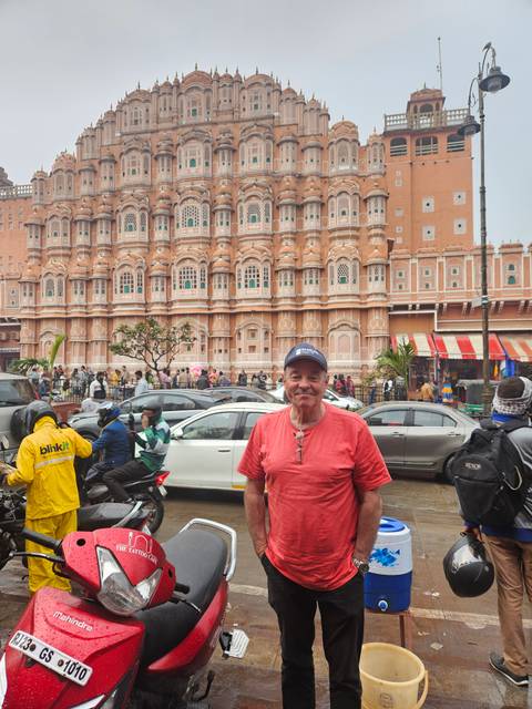Person standing in front of historic building.