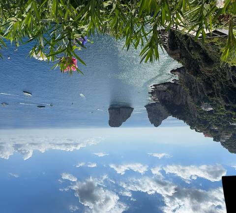 Rock formations rising from the sea.