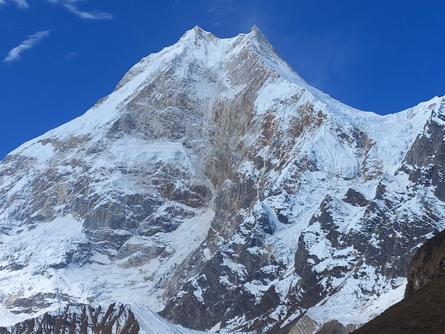 A magnificent snow-covered mountain peak.