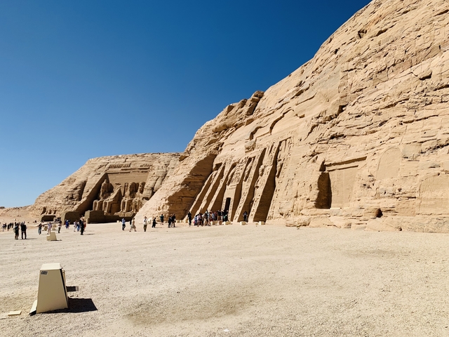 The Abu Simbel temples with tourists in the foreground.