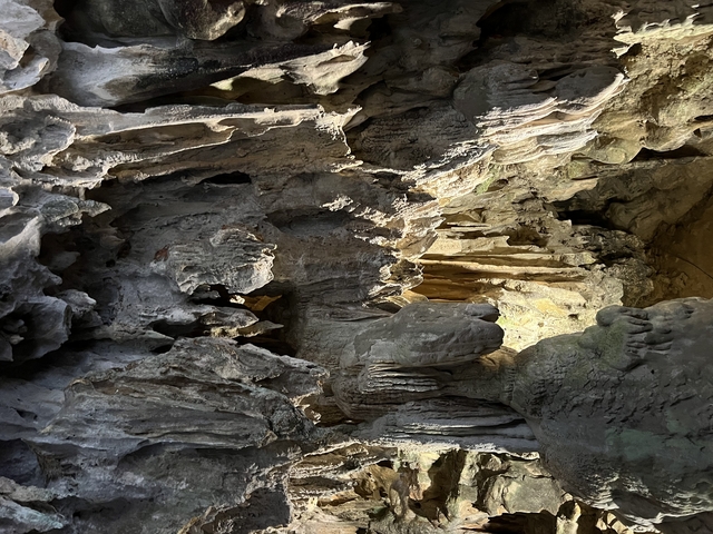 Close-up of cave formations with light shadows.