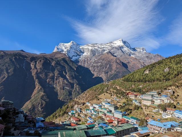Colorful small town nestled in a mountainous region.