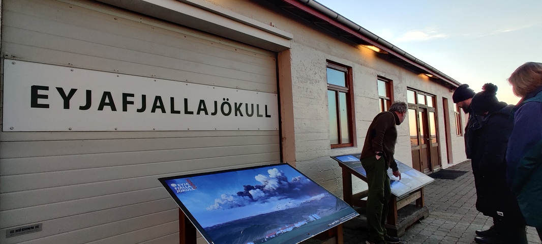       People examining educational panels about Eyjafjallajokull
  