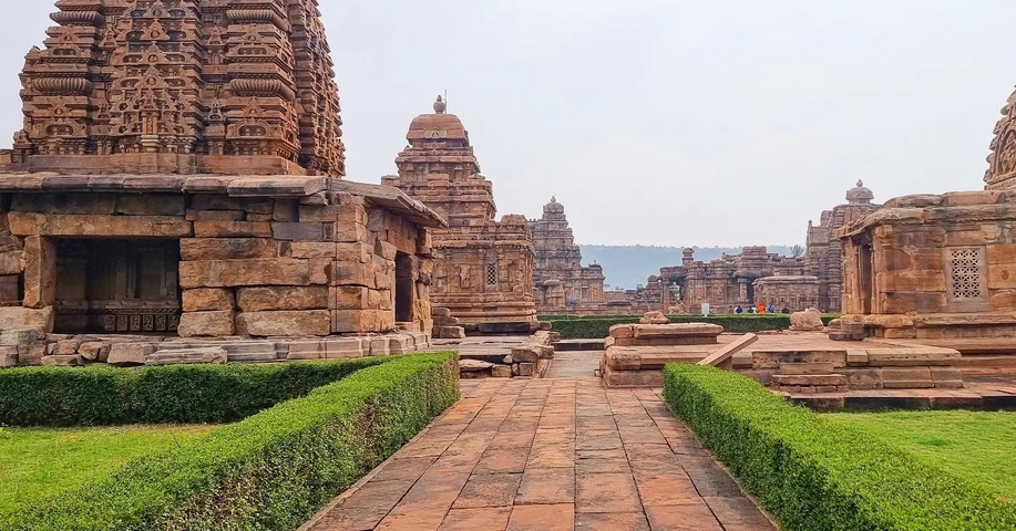       Ancient Hindu temple complex with well-maintained gardens.
  