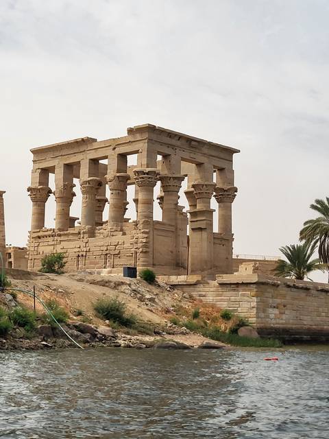       Temple ruins by the riverside.
  