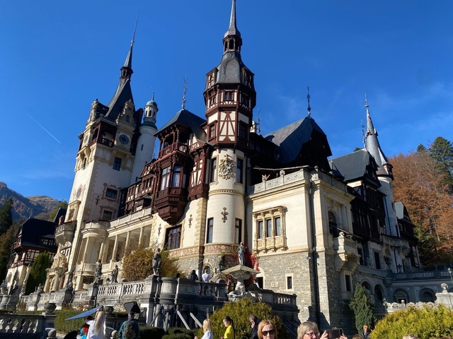 Exterior view of a grand castle on a clear day.