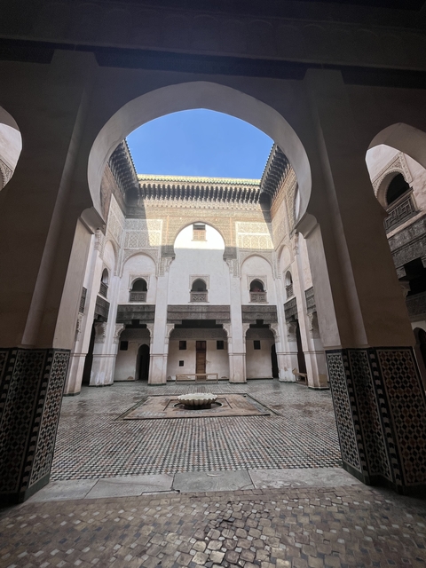       Intricate architectural details of an indoor courtyard.
  