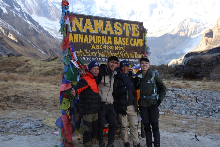 Group of people posing at Annapurna Base Camp.