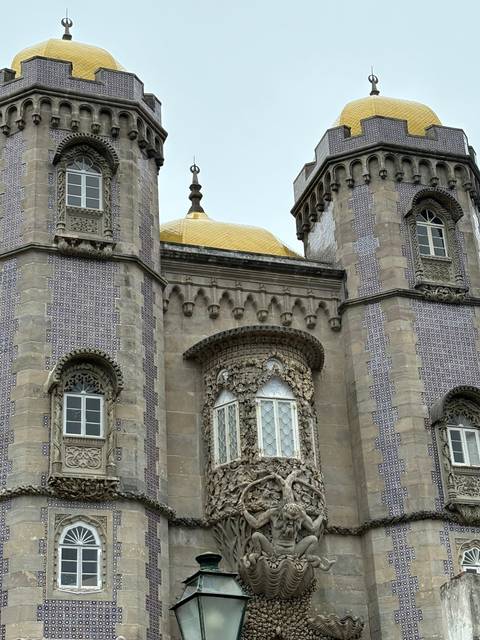 An elaborate building facade with decorative features.