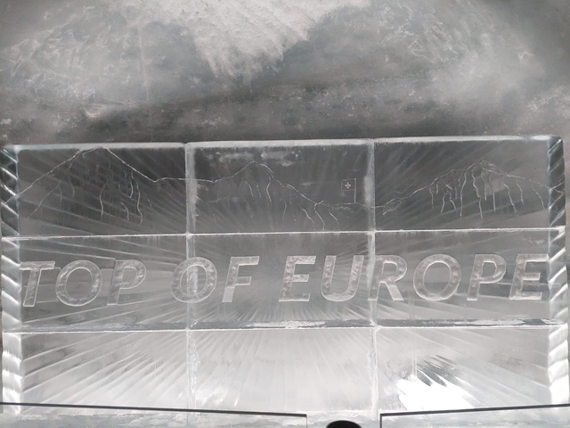       Ice sculpture with text 'Top of Europe'.
  