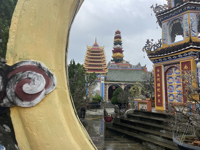       Pagoda complex with colorful architecture.
  