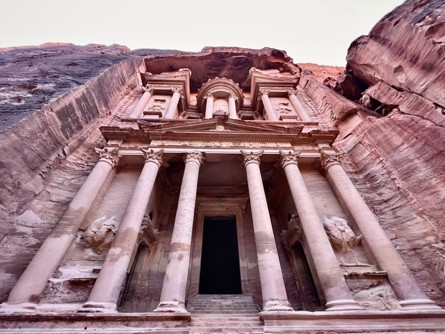       The famous Treasury carved into sandstone in Petra.
  