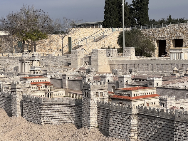      Miniature model of an ancient city with detailed structures.
  