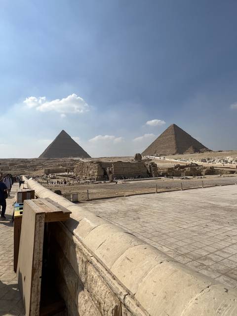       Pyramids view on a sunny day with clear blue sky.
  