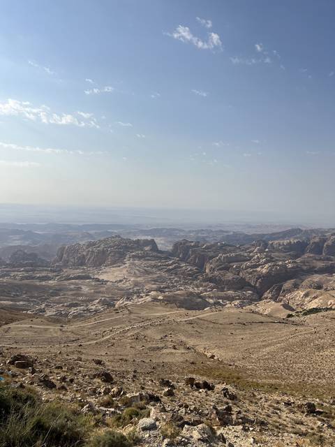       Vast landscape with rugged mountain terrain.
  