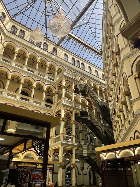       Interior of a shopping area with decorative columns
  