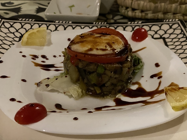       Elegant plated dish with gourmet presentation.
  