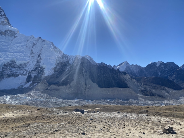 Mountain range with sunrays shining down