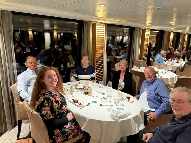 A group of people dining together.