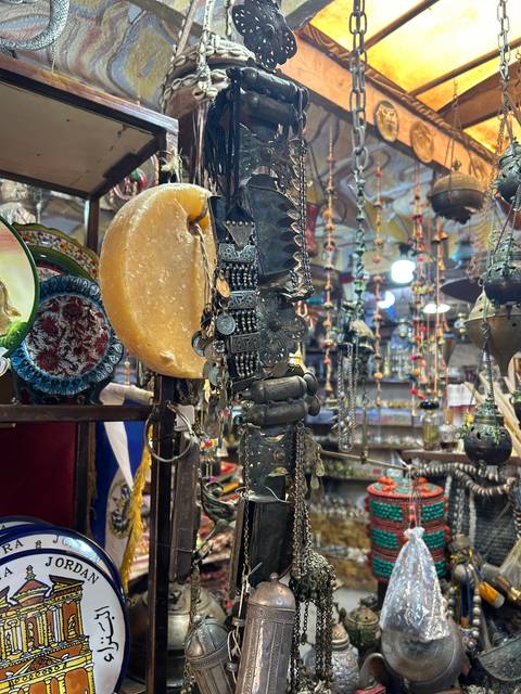 Eclectic mix of vintage items and souvenirs for sale.