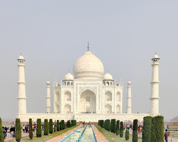       The Taj Mahal with its iconic white marble structure.
  