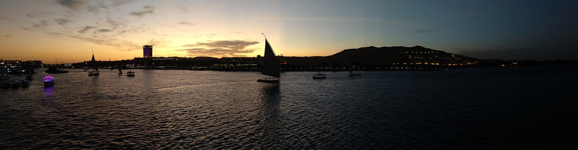 Sailboats on the Nile River during sunset.