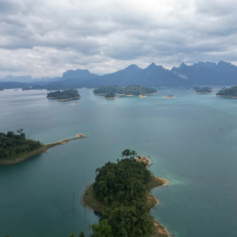       Aerial view of islands and water.
  