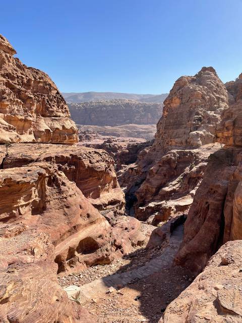 Rocky canyon with a path leading through Petra.