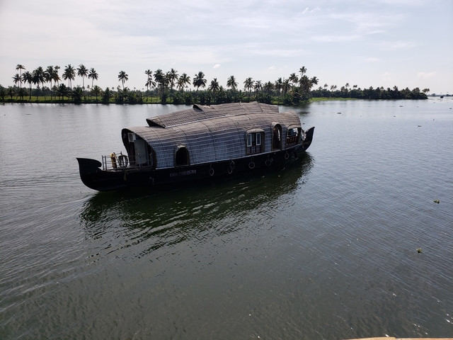 Traditional houseboat on a lake.
