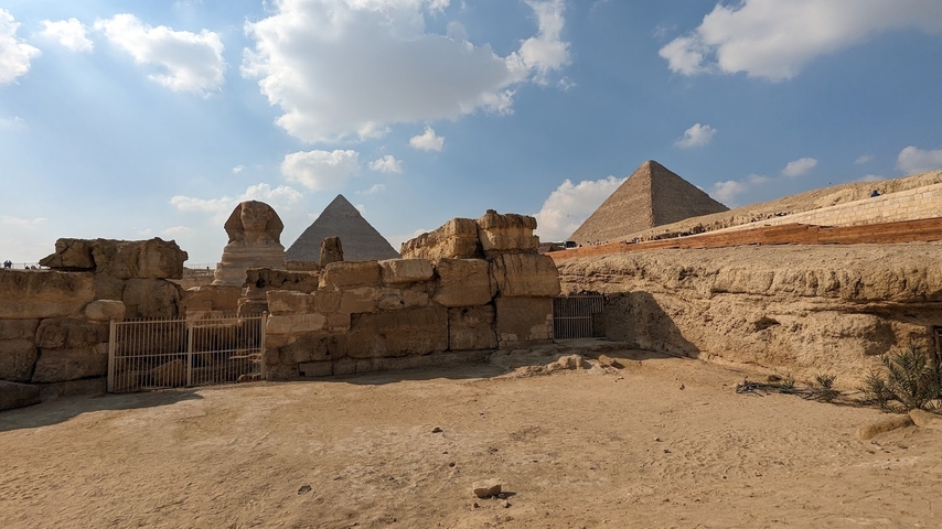 Distant view of the Giza pyramids in a sunny day.
