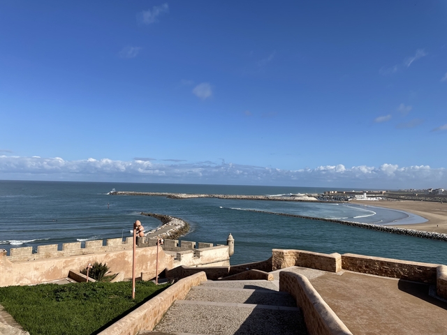 Scenic view of a coastal fort and sea.