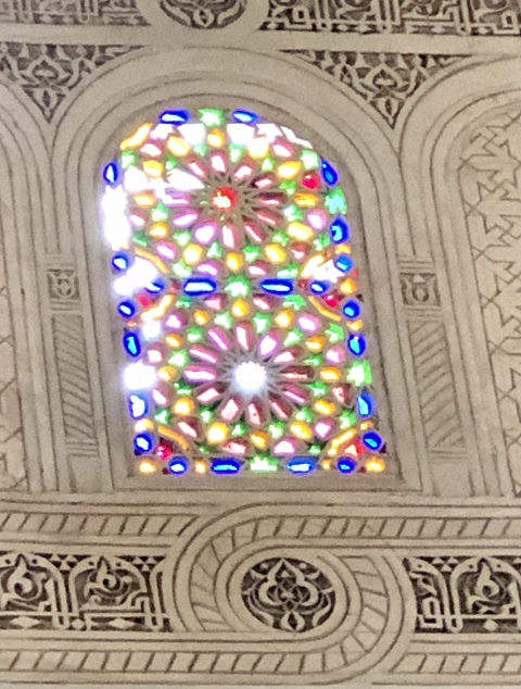 Ornate stained glass window.