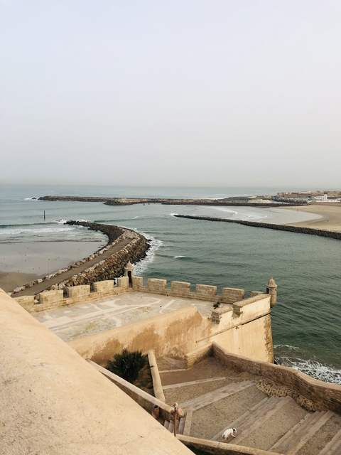 Coastal view with a pier and ocean.