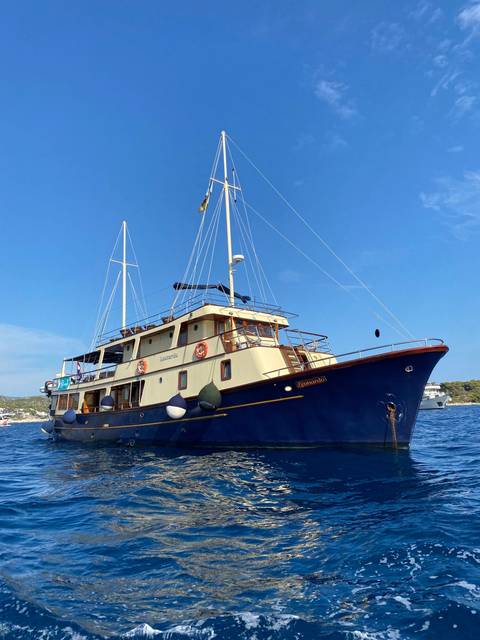 A modern sailboat on the water.
