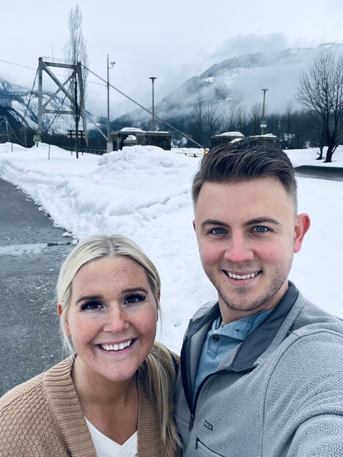       Couple with snow-covered landscape.
  